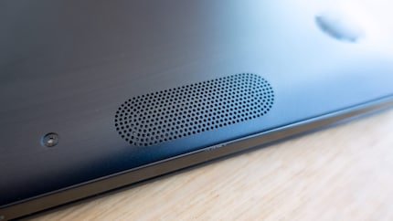 As long as the computer is on the table, the sound is OK.