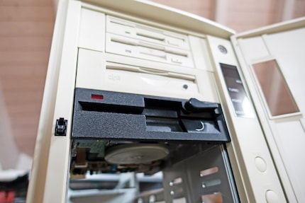 As seen from above: a 3.5-inch floppy disk drive, a Super Disk Drive, a Zip drive and a 5.25-inch floppy disk drive.