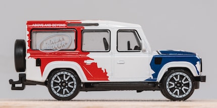 Sir William Jones with his Land Rover Defender.