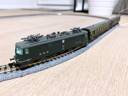 The legendary Ae 6/6. Here we have the «city of Basel», including two «SBB train cars». Definitely one of the most beautiful locomotives to ever pass through our country (or my apartment).