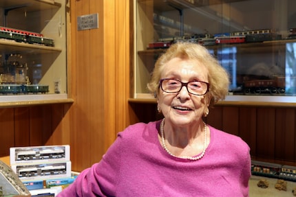 Neither customers nor viruses can dampen her spirits: Ms Neisser in her model train store, which she has operated at this location since 1981.