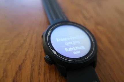 The dial and the button on the left.