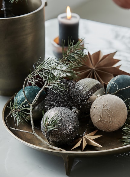 Le bocce non devono per forza essere appese all’albero. Immagine: House Doctor