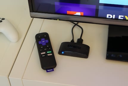 The Roku Express 4K is smaller than its remote.