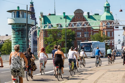 A common picture in Copenhagen: helmetless cyclists.