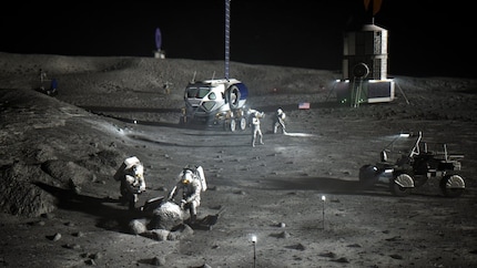 La visualizzazione della Nasa mostra il rover lunare e gli astronauti al lavoro nell'area intorno al polo sud della Luna.