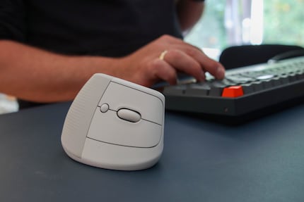 The three buttons and the clickable scroll wheel on the outside