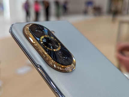 Huawei uses the three cameras on the back for an eye-catching design element.