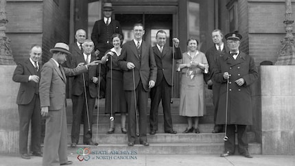 Pedro Flores (front left) with a group in front of the Raleigh city hall.