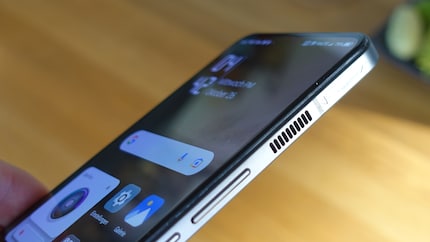 The fan sucks in air from the back of the device and releases it on the right side.