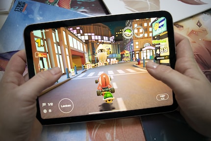 For titles such as Mario Kart, the iPad Mini acts as a replacement handheld.