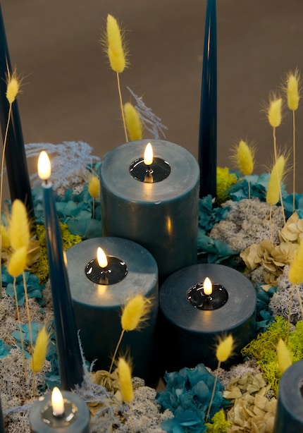 Die LED-Kerzen «Shiny Blosson» verbreiten das sanfte Flackern und Glühen echter Kerzen.