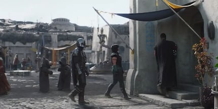 A statue of IG-11, the selfless saviour of Nevarro, can be seen in the background.