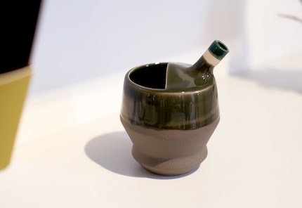 Colour makes the ceramic spill-proof cup look prettier.