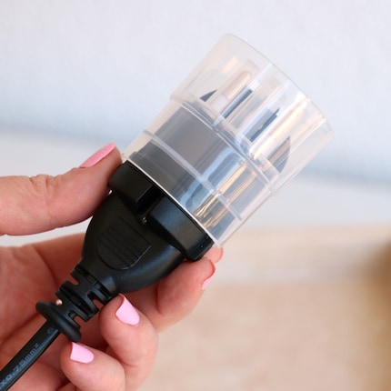 Pop the fixed adapter onto the plug.