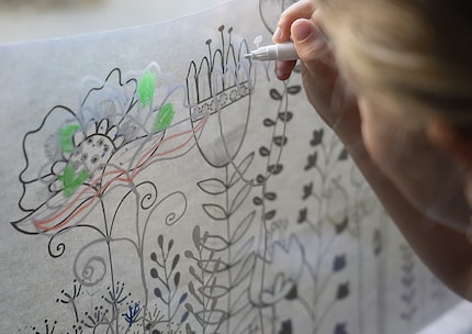 The third and final try: my older daughter puts the white pen to work.