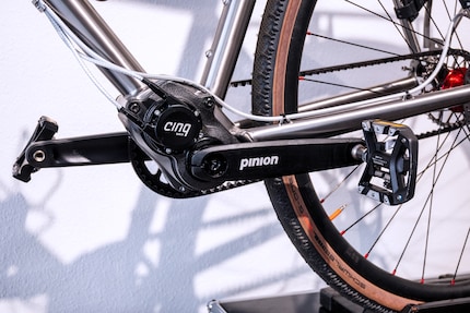 The bottom bracket gears are made by Pinion; the belt by Gates.