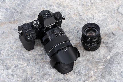 The Fujifilm X-S20 is small, but still comfortable to hold. The 16-80 mm lens (on the camera) is larger than the other travel zooms. The 23 mm f/2 (right), however, is the smallest prime lens of the bunch.