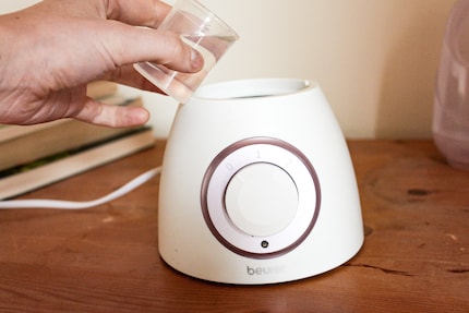 The base unit contains the water, which later billows into my face as steam.