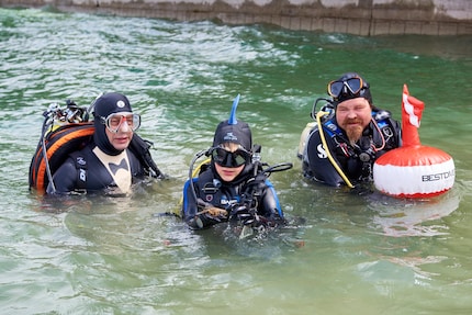 Waste Diver President Matthias Ardizzon (pictured left) with club members.