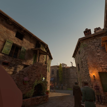 Monteriggioni: la cittadina ha un aspetto vivace. Sulla sinistra dell'immagine si vede la punta del naso di Ezio.