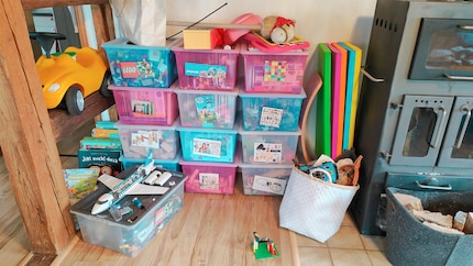 Zoe’s toy boxes in the living room, almost as tall as Mount Everest.