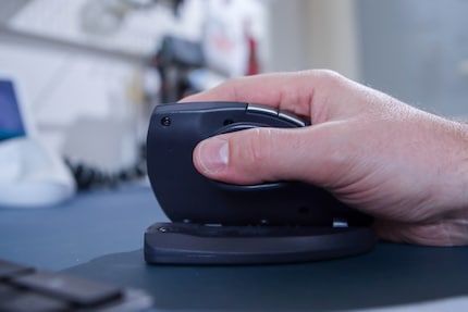 The thumb has its own movable resting surface.