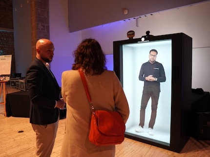 Teleported directly from the Netherlands office to the MWC as a hologram.