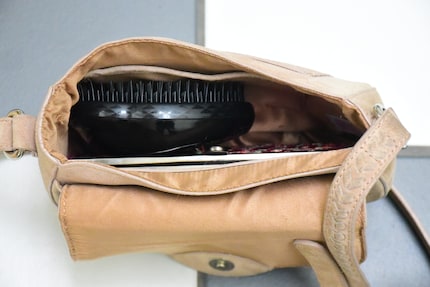 Anche nella mia borsetta più piccola c'è ancora spazio accanto alla Tangle Teezer.