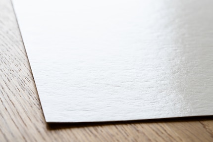 Lucida, ma non noiosa: secondo me la FineArt Baryta di Hahnemühle è ottima.