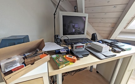 My retro gaming desk has fallen on hard times. I should really tidy it up.