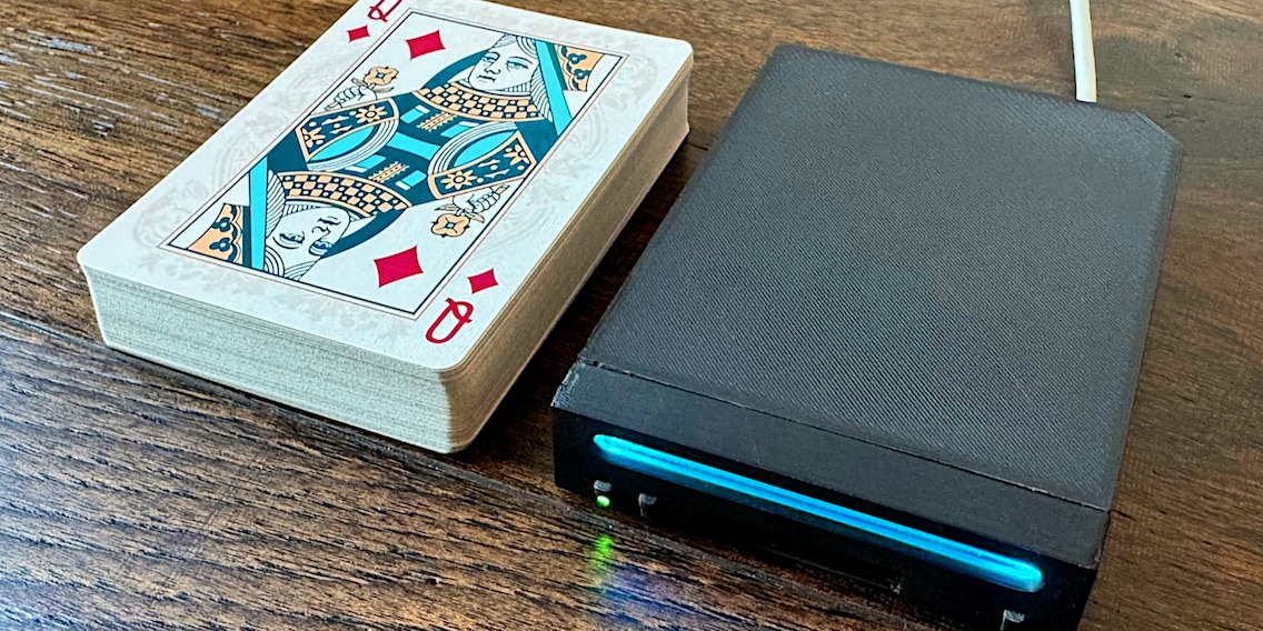 Because he can: User converts a Wii to the size of a deck of playing cards