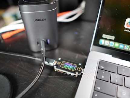 My MacBook drew 50-60 watts of power while charging.