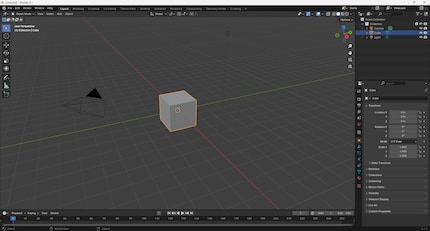 The original start screen of Blender: An example cube (the default cube) is waiting to be edited. There is no help available.