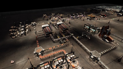 The result of much tinkering: two multi-regolith refineries and their smelting furnaces.