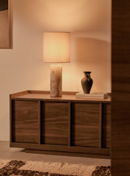 The harmonious interplay between these materials adds a special touch to any room.