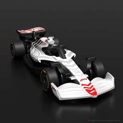 The white F1 car is a collector's item with a special paint finish featuring Hot Wheels lettering.