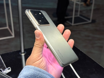 Despite its above-average battery, the Realme fits comfortably in the hand.