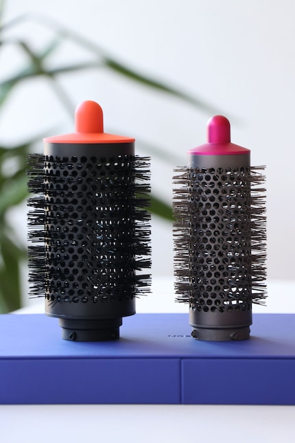The large volume brush on the left, the regular size on the right.
