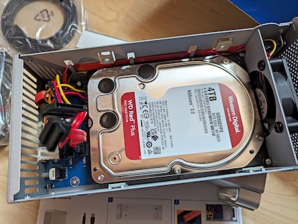 The two hard drives are placed on top of each other.