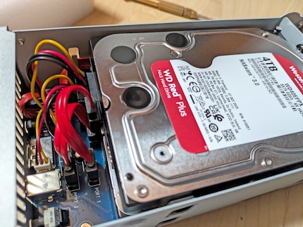 Connecting the power and data cables.