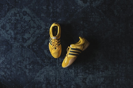 Sleek and golden, the Bad Bunny × Adidas Ballerina.