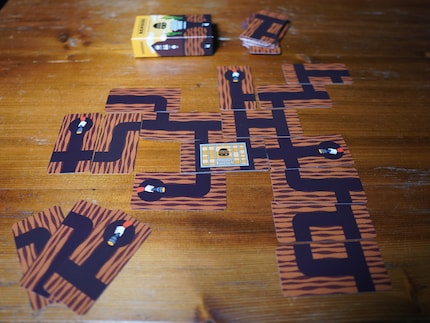 The supposedly small card game takes up a lot of space on the table.