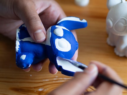 There’s just about enough blue paint for one Stitch. If you wanted to paint a second one, you’d have to use your own acrylic paint.