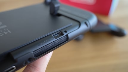 Well hidden: the SD card slot is located under the stand.
