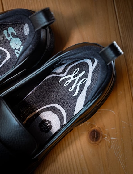 The insole is patterned in silver.
