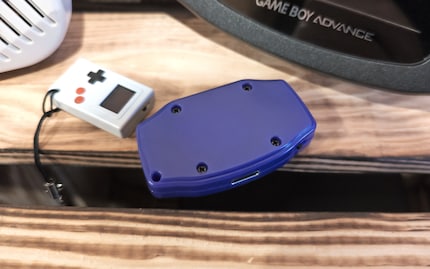 Four screws hold the plastic housing together.