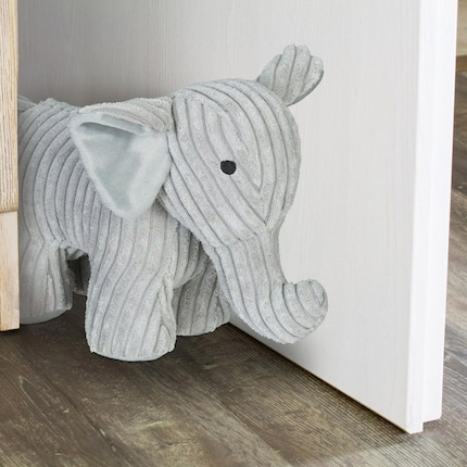 This cuddly doorstop is filled with sand to stabilise it.
