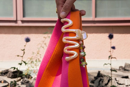 Laura’s creation really comes into its own on her colourful bag.