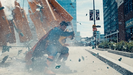 Superman standing protectively in front of a child – nothing screams Superman more.